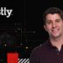 Marshall Erwin, Chief Security Officer at Fastly, with Fastly's official white logo and graphical cybersecurity environment